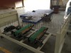 Automatic rewinding and perforating paper machine