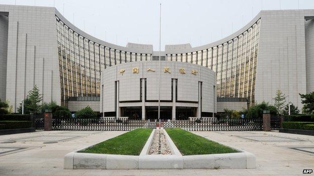 China cuts bank reserve ratio to boost lending