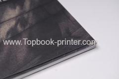 High-quality paper dust jacketted spot UV coated softcover or softback book printer
