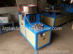 Plastic cap folding machine