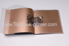Cloth cover gold-stamped hardcover brochure with gold cardboard dust jacket