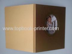 A4 standard embossing cover section sewn hardcover or hardback book with round copper window
