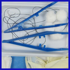 Disposable debridement and suturing kit
