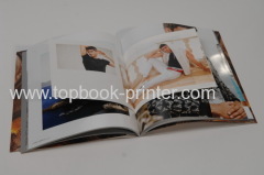 Top-grade spot UV coating cover matte lamination softcover or softback book with dust jacket flaps printing