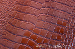 Brown color shiny and embossed leather