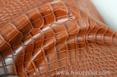 Brown color shiny and embossed leather