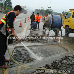 Rapid concrete bridge deck hole repair material