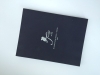 Design print and bind silver-stamped black cloth sponge cover hardback three-layer books on demands