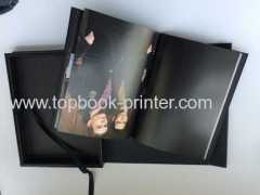 Gold stamped semi-digest silk cover uncoated paper hardbound book with leather cover slipcase