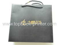 Custom designed black cotton rope gold stamping craft paper packaging bag