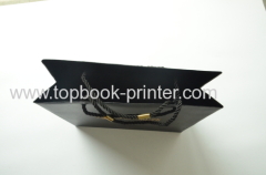 Custom designed black cotton rope gold stamping craft paper packaging bag