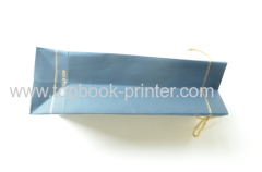 high-grade gold stamping ivory board paper clothing packaging bag with yellow cotton ropes