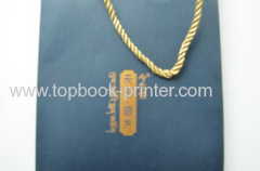 high-grade gold stamping ivory board paper clothing packaging bag with yellow cotton ropes