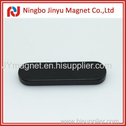 Alien shaped permanent magnet with epoxy coat