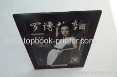 Paper photo frame book placed on table or desk with die-cut ivory board support