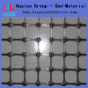 Retaining wall reinforcement geogrids