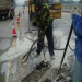The procedure of repairing concrete bridge deck pothole.