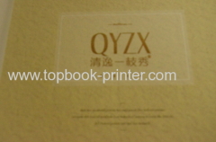 OEM high glossy paper debossed & embossed cover clothes brochure softback book printer