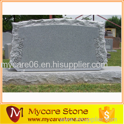 Scallop and shellrock tombstone