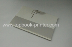 gold stamped cover thread bound softback book with flaps