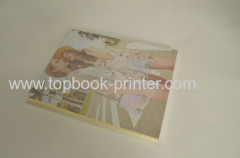 silver stamped cover softback book with PVC dust jacket