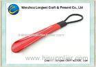 Medium size multicolor plastic shoe horn with convenient handle