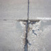 how to repair holes in concrete floor