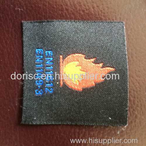 fire retardant woven label for fire resistant fabrics