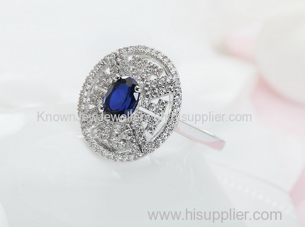 Decent Platinum Plated Sapphire Ring with CZ Side Stone