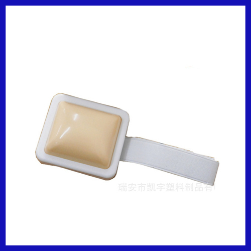 White Plastic injection practice pad for nurse to practice the injection