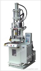 Vertical injection molding machine