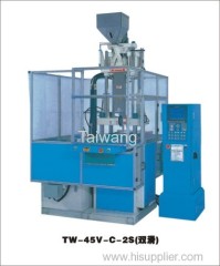 Vertical clamping horizontal injection of double sliding plastic injection machine