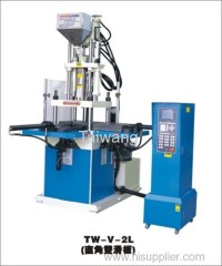 Vertical plastic injection molding machine with right angle double slide