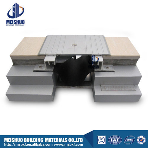 Aluminum expansion joint with safe serrated surface