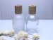 Promotion perfume empty glass bottle with knob lid for wholesale