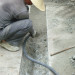 how to repair concrete driveway cracks