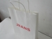 Custom designed gold stamping craft paper packaging bag with white cotton rope