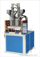 Double colors disc vertical injection molding machines