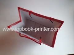 Gloss laminated art paper wedding gift packaging bag with red cotton rope printing