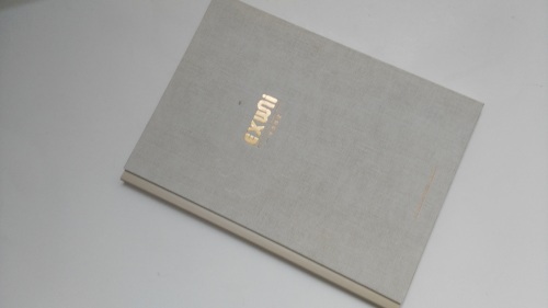 Linen texture cover casebound laser engraved hardback book printed for clothing company