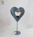 Heart shape metal candle holder with goldleaf covered inside Stand design