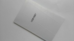 Silver foil cover softback brochure or pamphlet printed for advertisements of clothing store