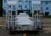 China 3 axles transport 60 ton low bed semi trailer with rail and step wise