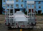 China 3 axles transport 60 ton low bed semi trailer with rail and step wise