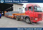 Customized dimension tri - axle 60 tons Low Bed Trailer with hydraulic ramps