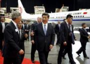 China's Xi promises better investment climate as Boeing announces China plant