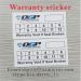 Custom 2.5x5centimeter stickers printed black and green on white eggshell vinyl of the free design warranty sticker