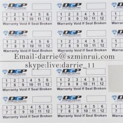 Custom 2.5x5centimeter stickers printed black and green on white eggshell vinyl of the free design warranty sticker