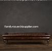 Dark brown leather ottoman footstool Covered in leather with Turned oak legs