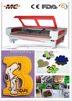 China made MC automatic fabric CNC CO2 laser cutter for sale